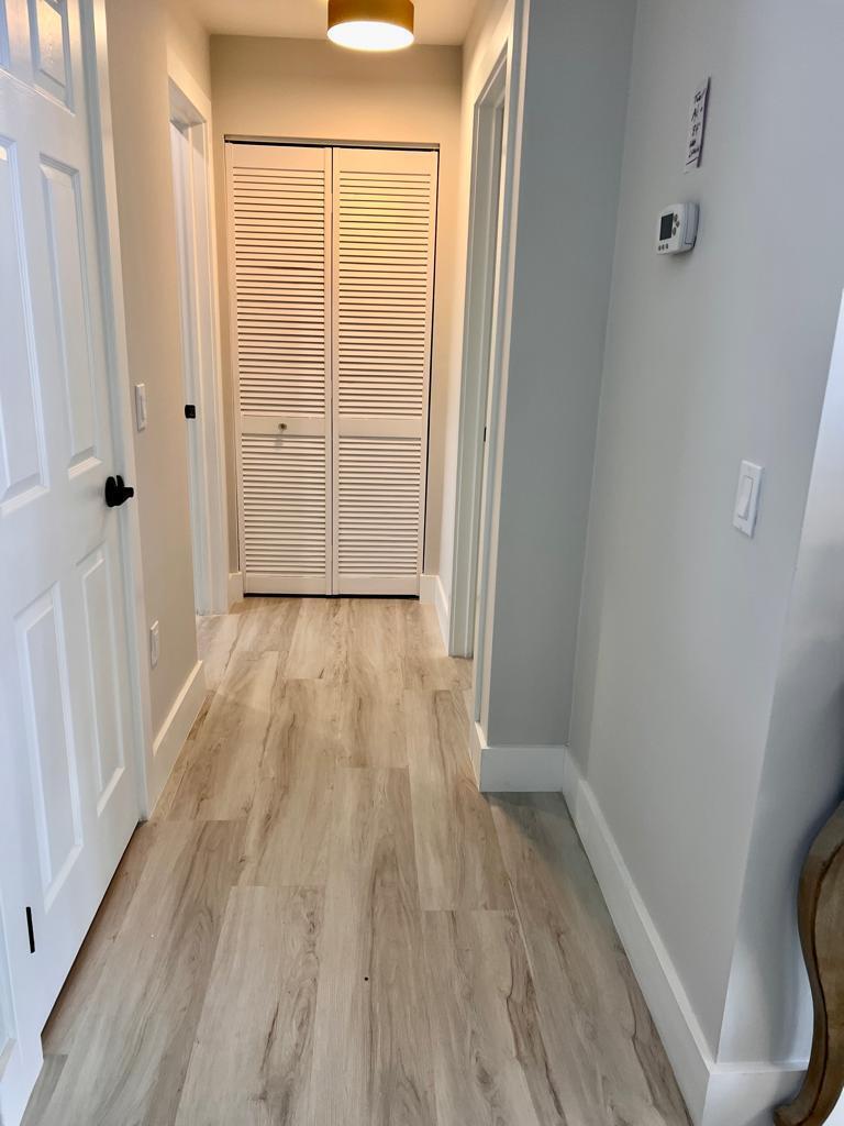 641 12th Street Key Colony Beach, FL 33051 - Photo 16 of 45 a view of a room with wooden floor and a window