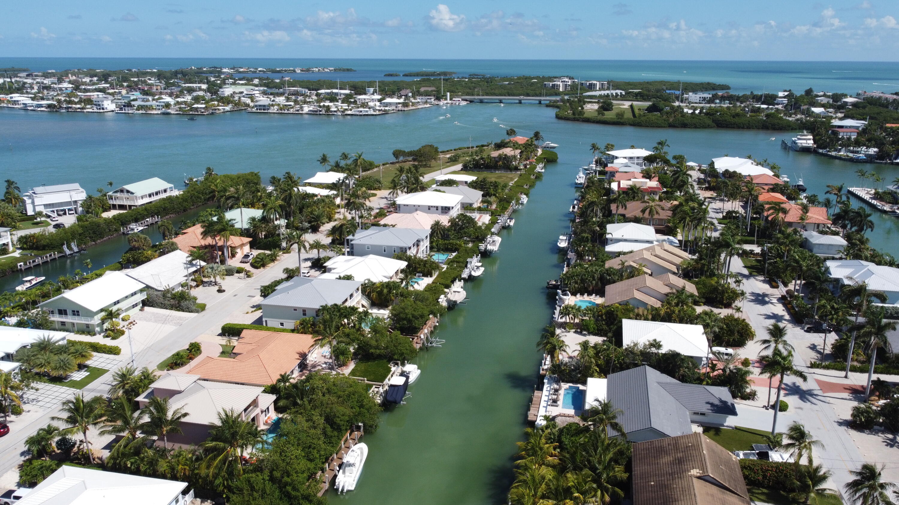 641 12th Street Key Colony Beach, FL 33051 - Photo 2 of 45 an aerial view of ocean and residential houses with outdoor space