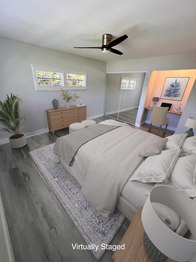 641 12th Street Key Colony Beach, FL 33051 - Photo 26 of 49 a bed room with a bed and a mirror