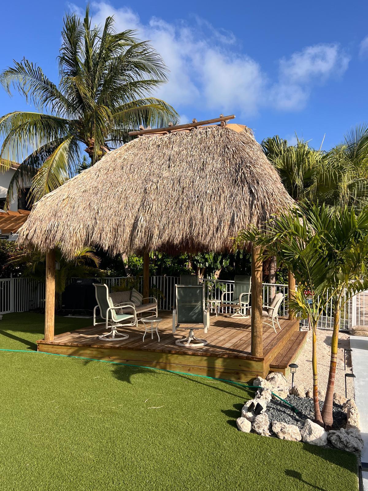 641 12th Street Key Colony Beach, FL 33051 - Photo 43 of 45 a swimming pool with outdoor seating and yard