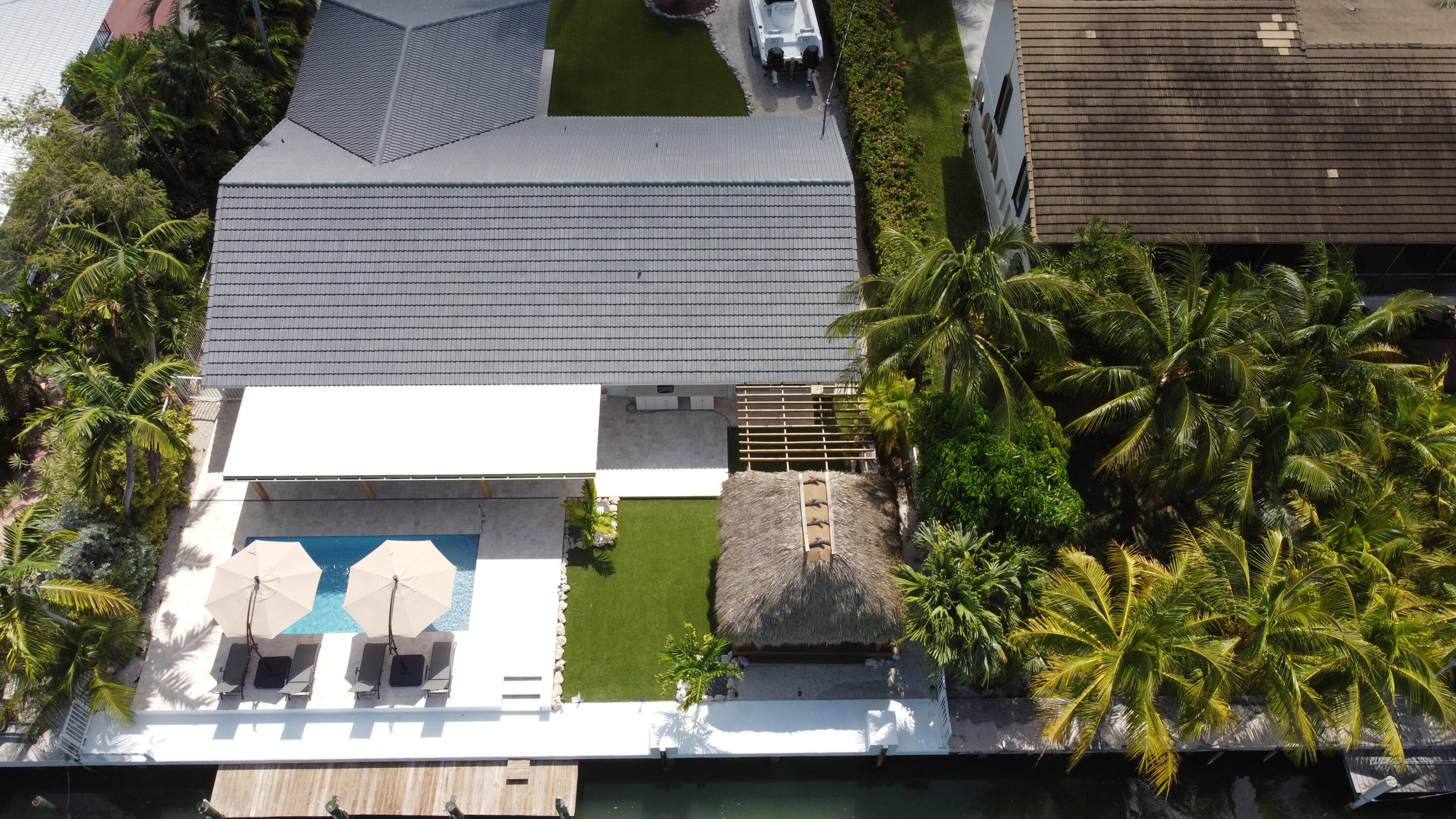 641 12th Street Key Colony Beach, FL 33051 - Photo 6 of 45 a front view of a house with garden