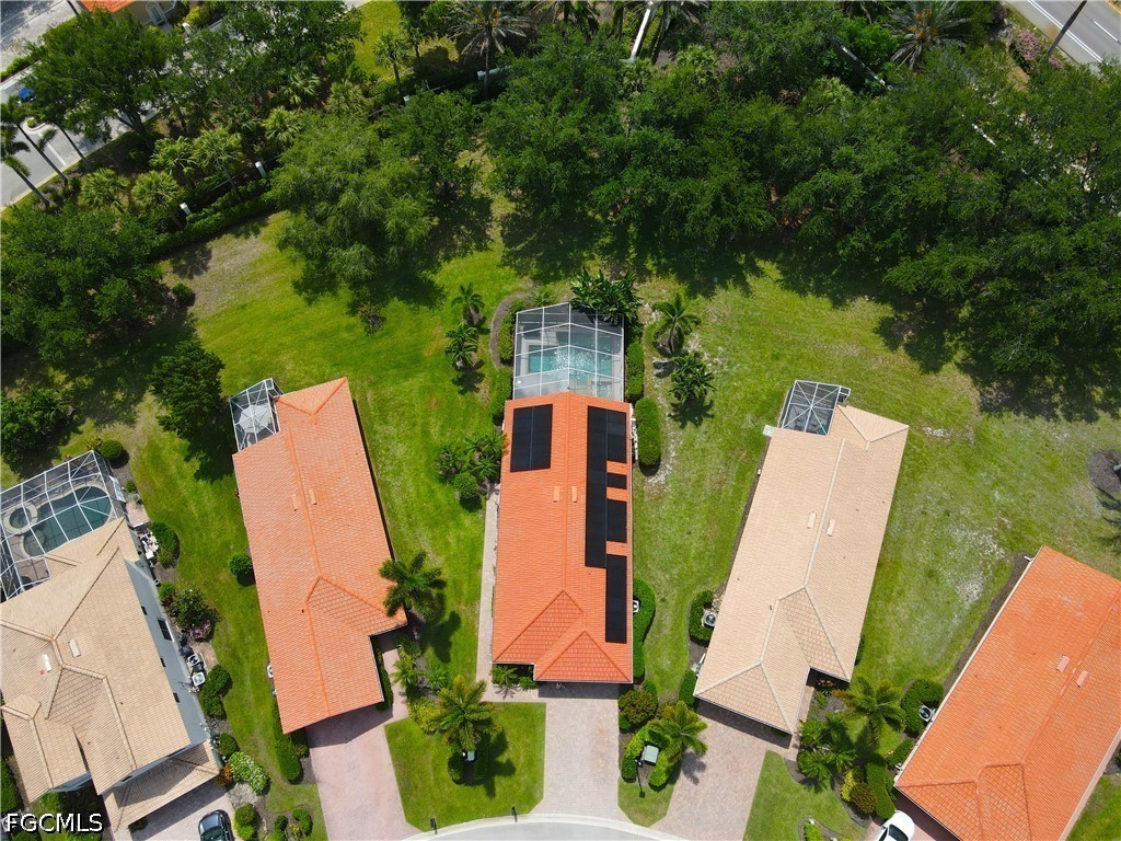 19694 Villa Rosa Loop Estero, FL 33967 - Photo 3 of 28 an aerial view of a house with outdoor space and lake view