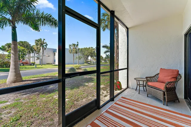 a view of a swimming pool with a lounge chairs