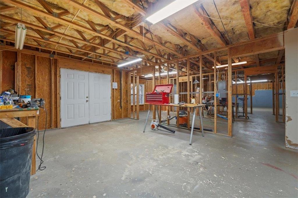 1218 Morgans Run Monroe, GA 30656 - Photo 34 of 39 a view of a room with wooden walls