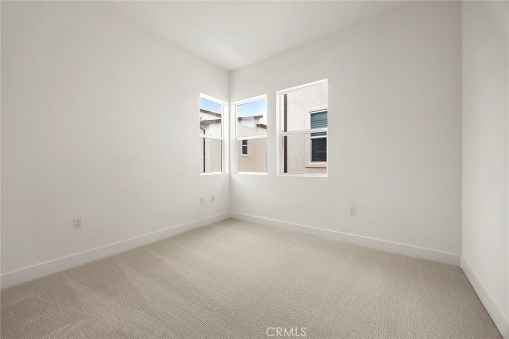 124 Tiffin Irvine, CA 92618 - Photo 12 of 26 an empty room with windows