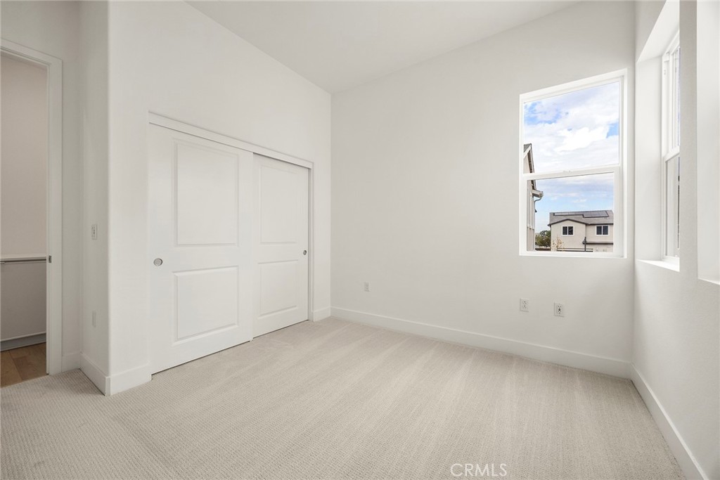 124 Tiffin Irvine, CA 92618 - Photo 13 of 26 an empty room with a window