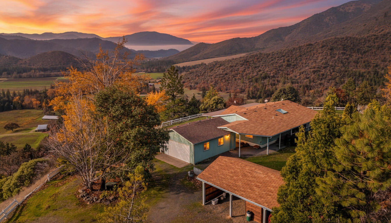 362 Humbug Creek Road Jacksonville, OR 97530 - Photo 1 of 49 an aerial view of a house with mountain view