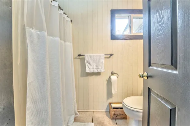 a view of a back yard from a balcony