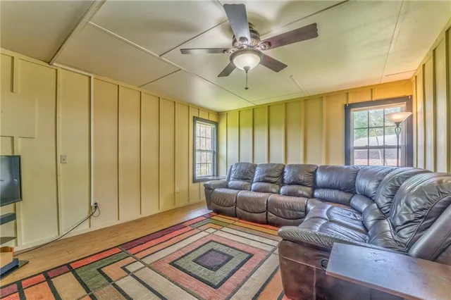 a living room with furniture and a window