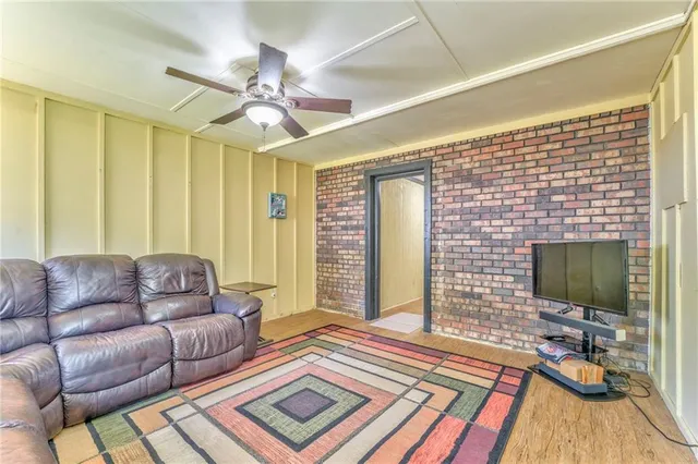a kitchen with stainless steel appliances granite countertop a stove and a microwave