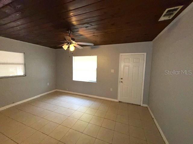 340 Mosley Road Lake Alfred, FL 33850 - Photo 4 of 13 a view of an empty room with a window