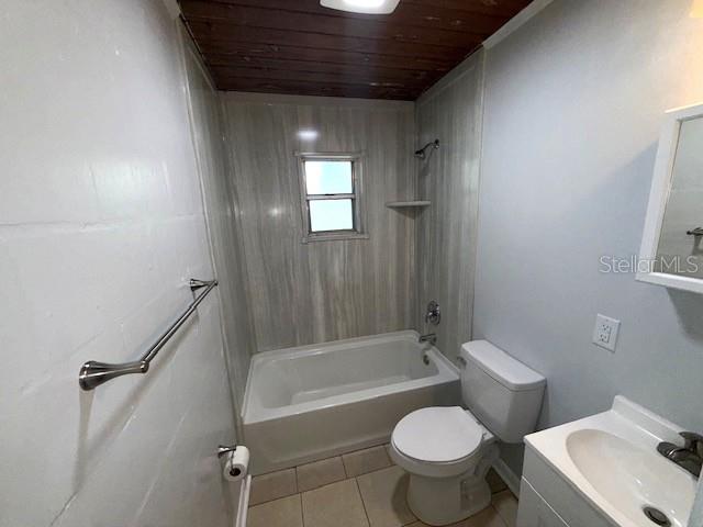340 Mosley Road Lake Alfred, FL 33850 - Photo 8 of 13 a bathroom with a toilet a sink and bathtub