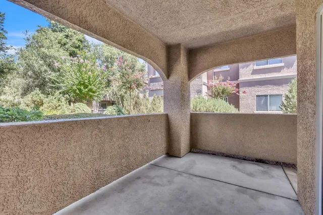 a kitchen with a refrigerator a stove top oven a sink and dishwasher