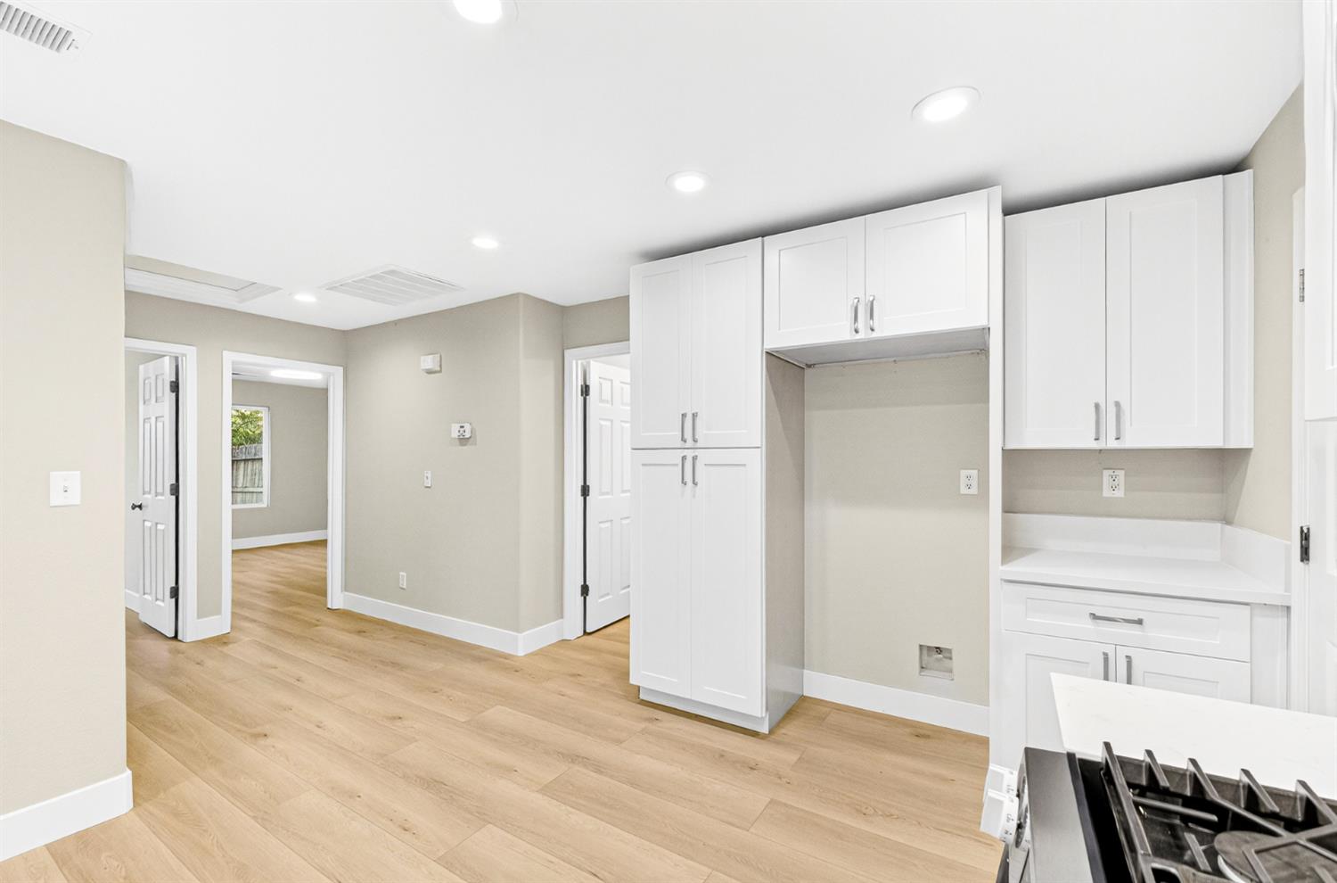 7481 Splendid Way Elk Grove, CA 95758 - Photo 14 of 41 a view of a kitchen with wooden floor and cabinets