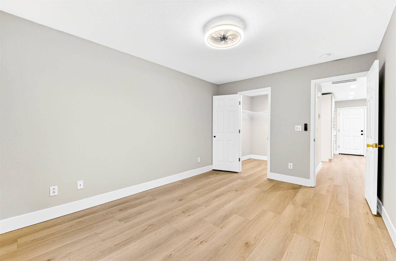 7481 Splendid Way Elk Grove, CA 95758 - Photo 27 of 41 an empty room with wooden floor and windows