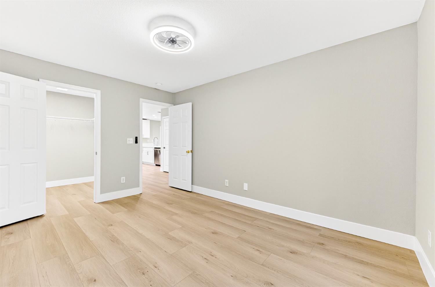 7481 Splendid Way Elk Grove, CA 95758 - Photo 28 of 41 a view of an empty room with wooden floor