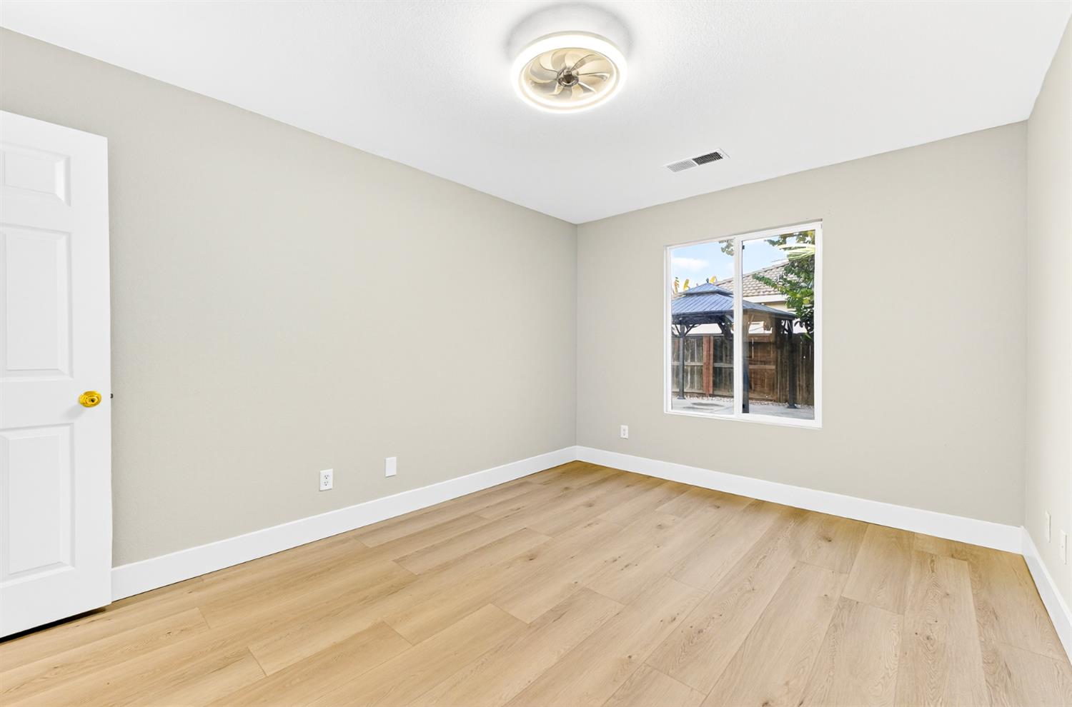 7481 Splendid Way Elk Grove, CA 95758 - Photo 29 of 41 an empty room with a window