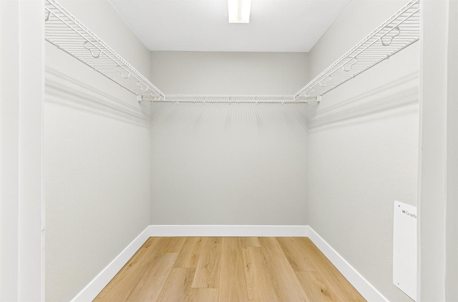 7481 Splendid Way Elk Grove, CA 95758 - Photo 31 of 41 a view of a room with racks on the wall