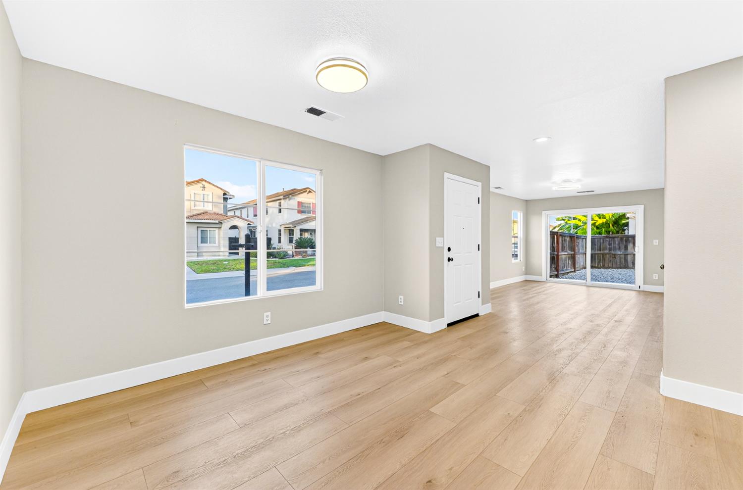 7481 Splendid Way Elk Grove, CA 95758 - Photo 5 of 41 a view of an empty room with a window