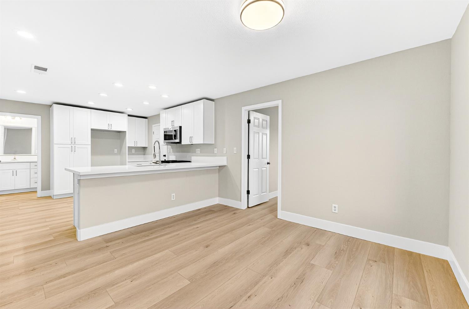 7481 Splendid Way Elk Grove, CA 95758 - Photo 6 of 41 a view of kitchen with wooden floor