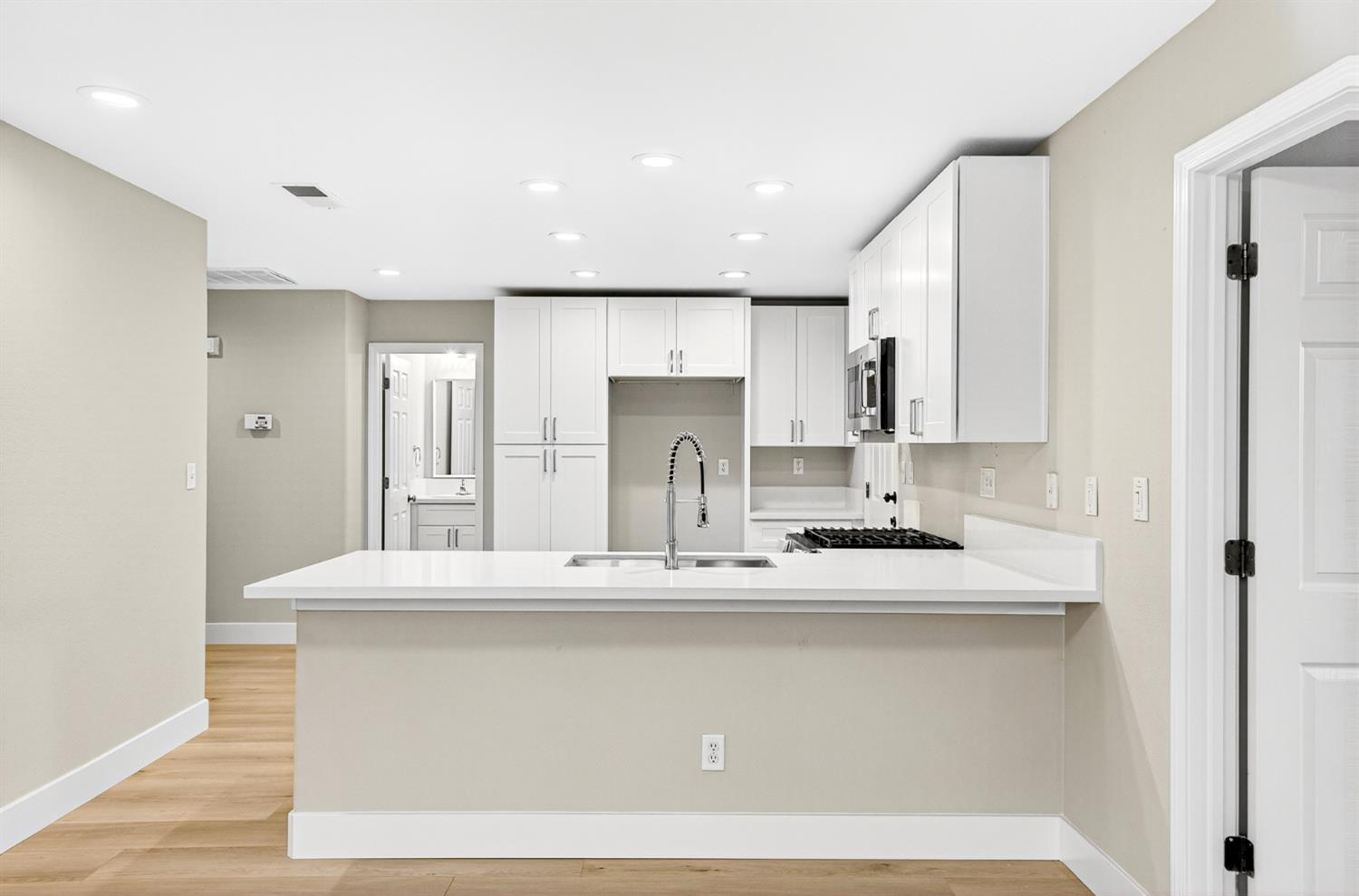 7481 Splendid Way Elk Grove, CA 95758 - Photo 10 of 41 a view of a kitchen with a sink a refrigerator and window