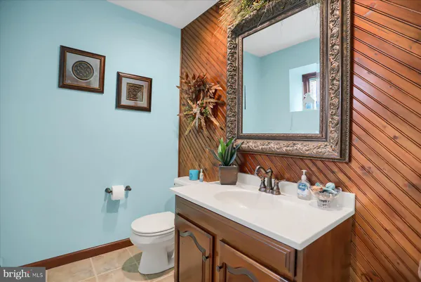 a kitchen with granite countertop a sink and a window