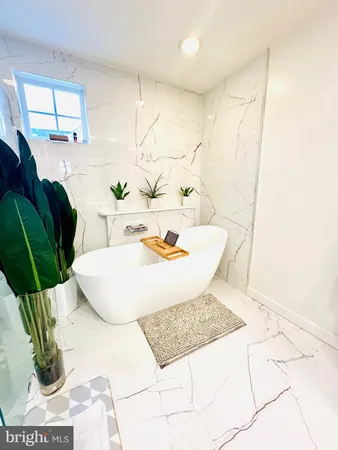 a view of a bathtub in a room