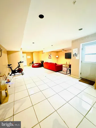 a bed room with a bed and a chair