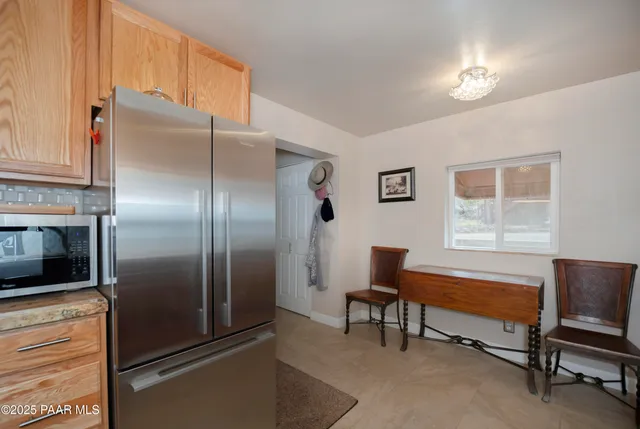 a living room with furniture and a tv