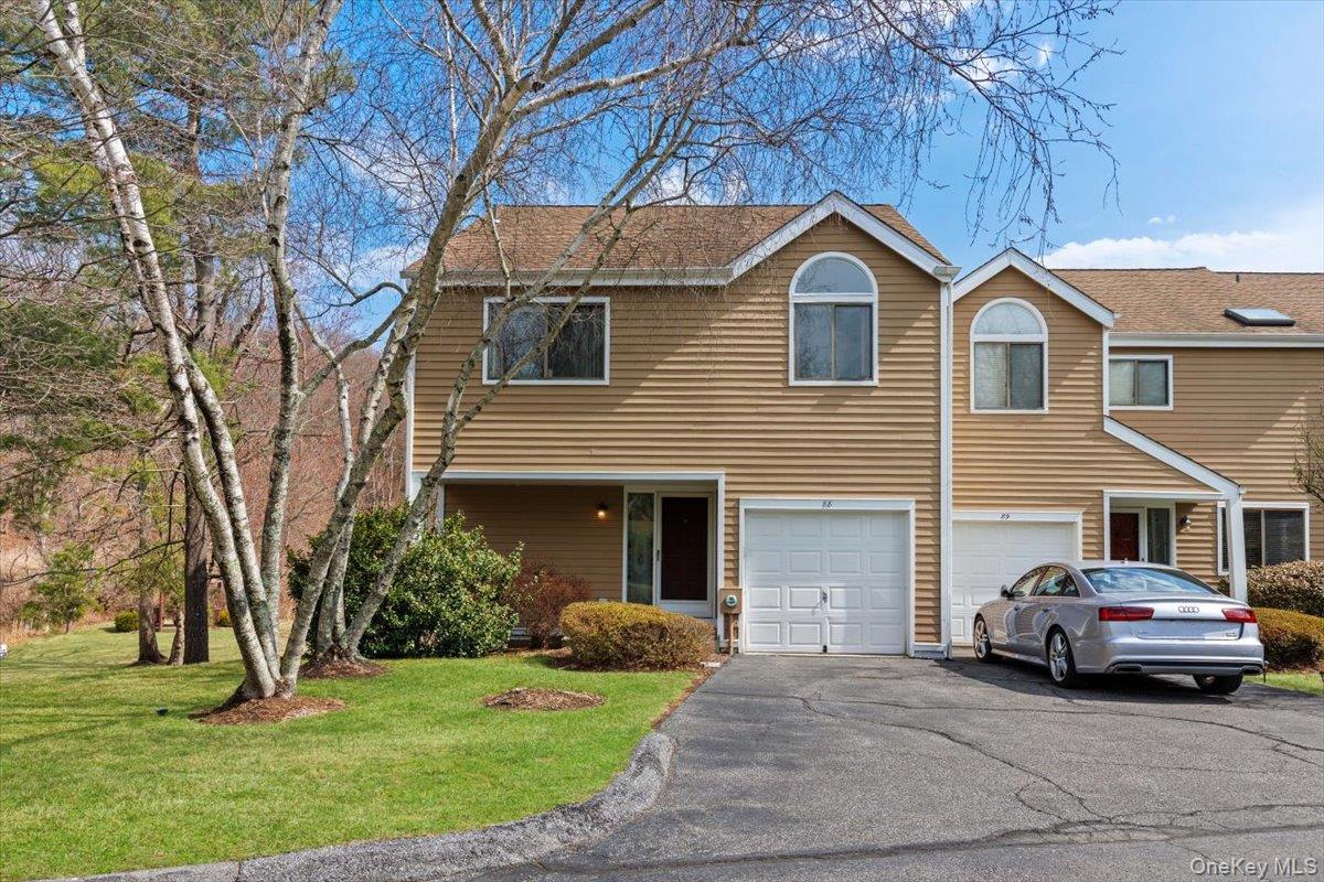 a house view with a garden space