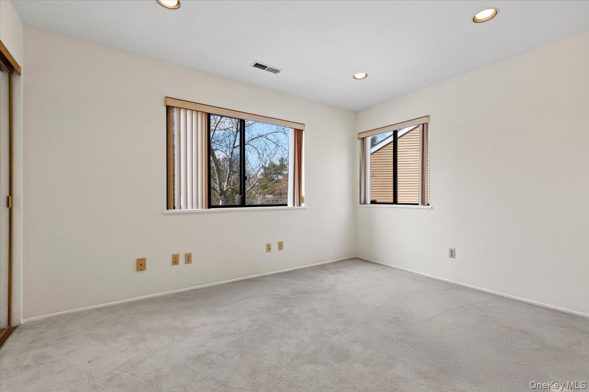 88 Farm Lake Cres Road Chappaqua, NY 10514 - Photo 11 of 22 an empty room with windows