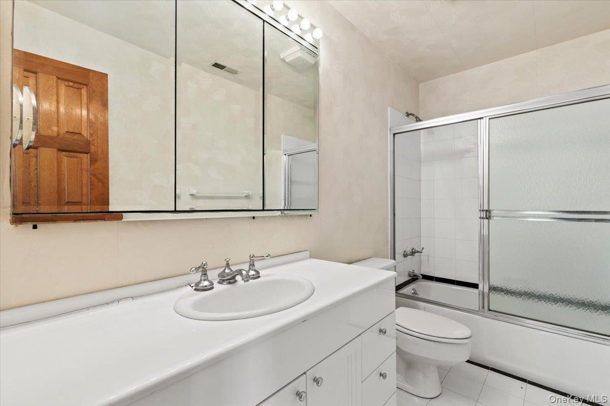 88 Farm Lake Cres Road Chappaqua, NY 10514 - Photo 12 of 22 a bathroom with a sink toilet and shower