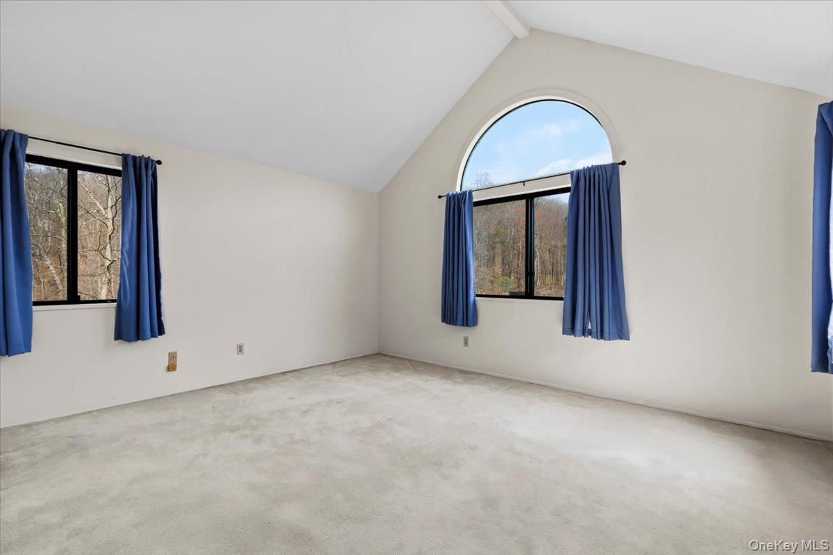 88 Farm Lake Cres Road Chappaqua, NY 10514 - Photo 13 of 22 an empty room with windows