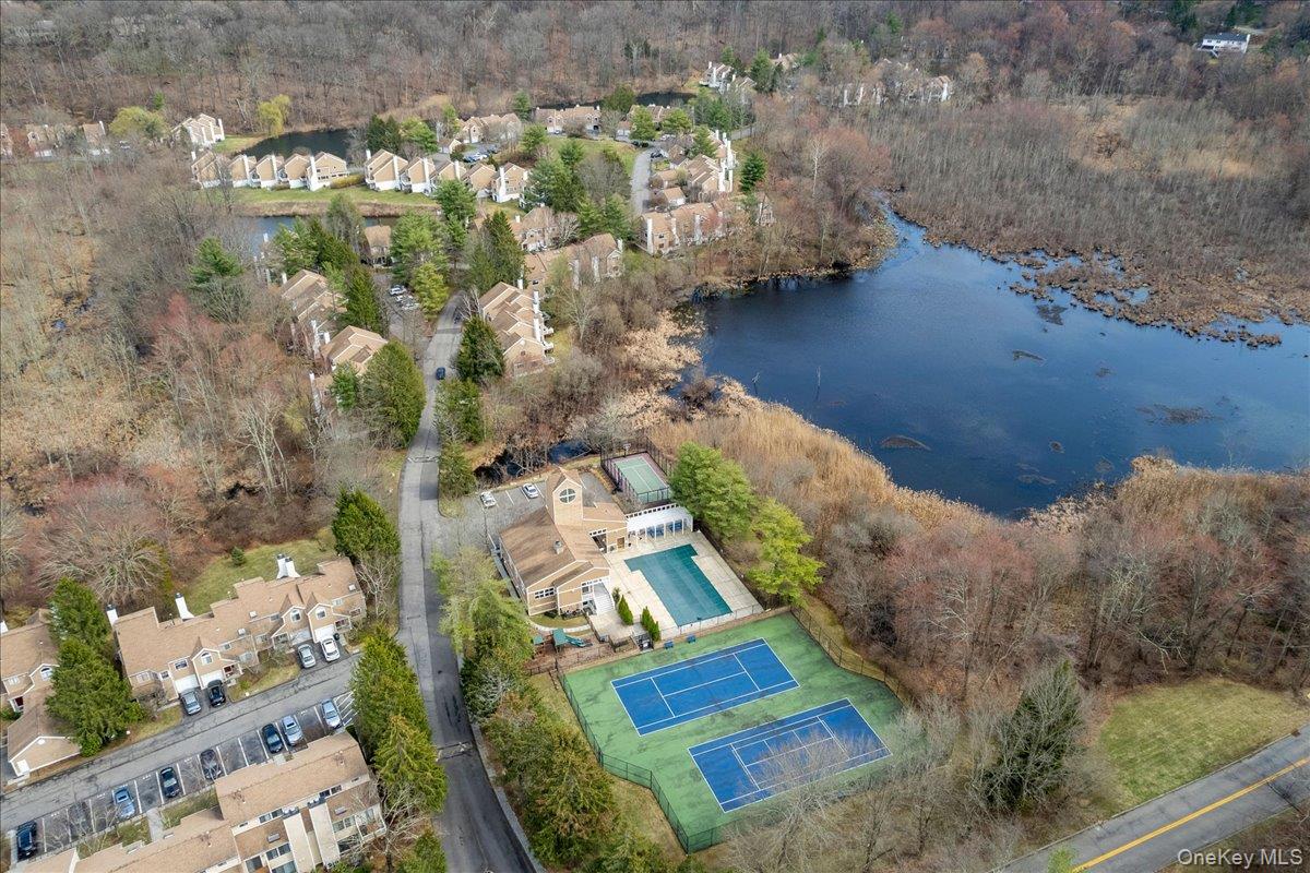 88 Farm Lake Cres Road Chappaqua, NY 10514 - Photo 21 of 22 an aerial view of a house with a yard