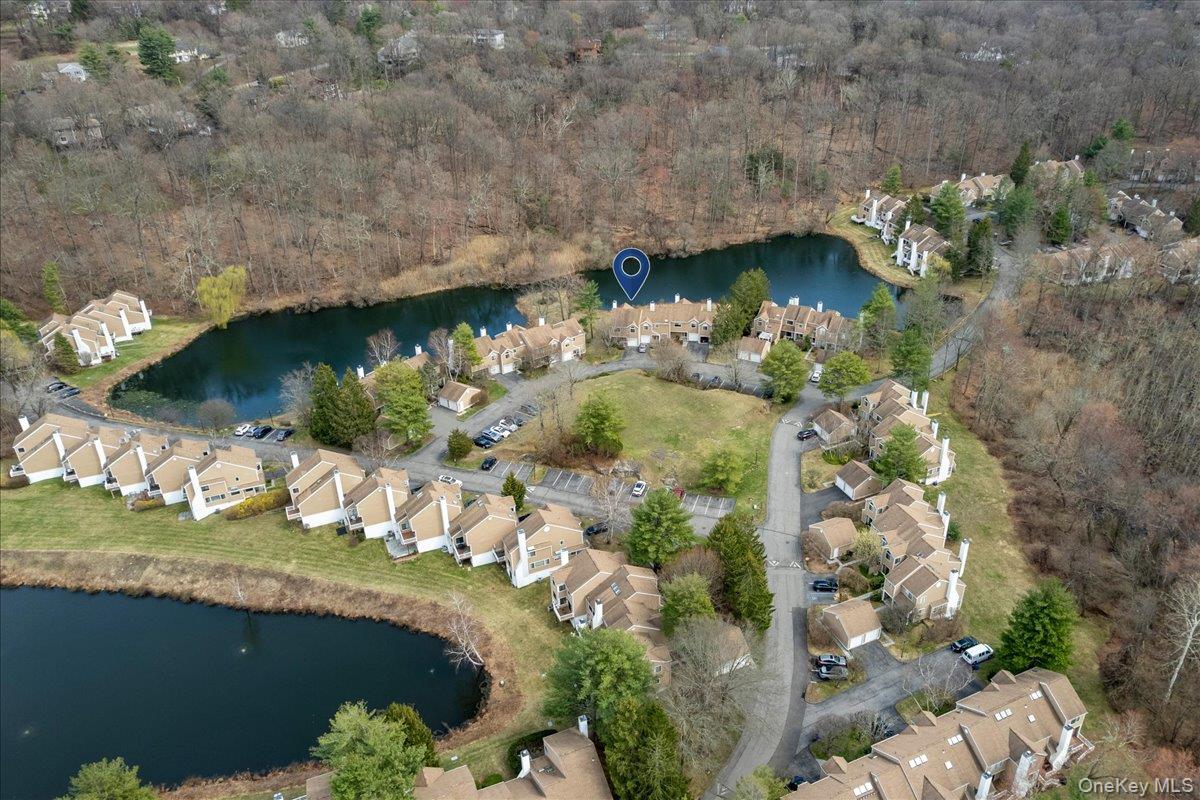 88 Farm Lake Cres Road Chappaqua, NY 10514 - Photo 22 of 22 a view of a lake with a yard