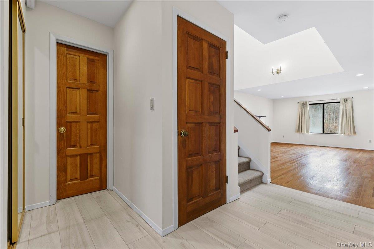88 Farm Lake Cres Road Chappaqua, NY 10514 - Photo 3 of 22 a view of a hallway with windows and entryway