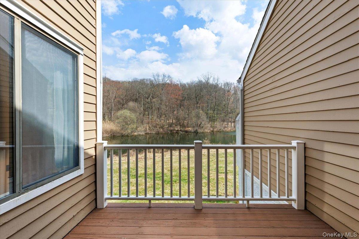 88 Farm Lake Cres Road Chappaqua, NY 10514 - Photo 10 of 22 a view of a building from a balcony