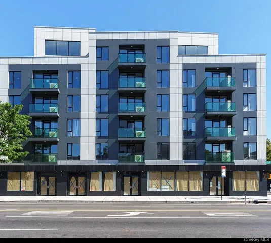 a view of building with a balcony