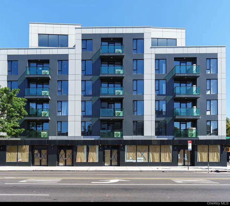 32-58 105th Street, Unit 4A Queens, NY 11369 - Photo 1 of 8 a view of building with a balcony