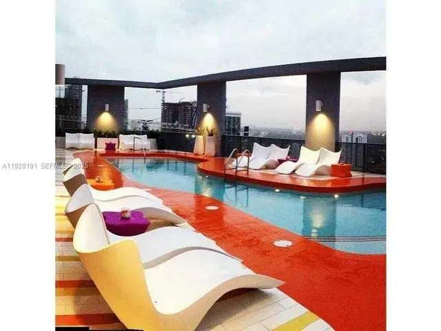 a outdoor space with a patio and swimming pool