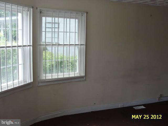 9214 Annapolis Road Lanham, MD 20706 - Photo 11 of 30 an empty room with a window
