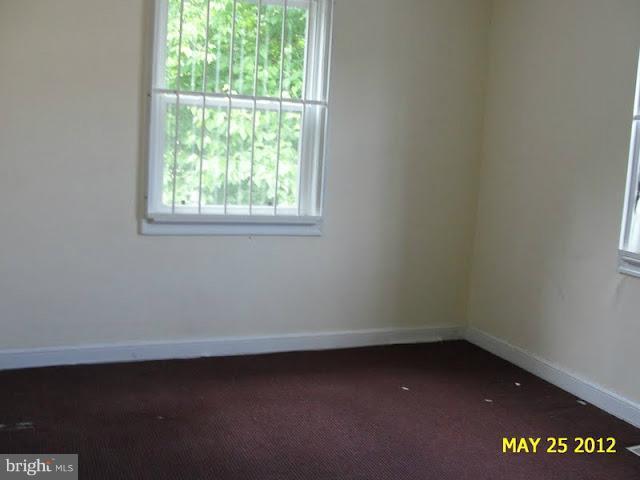 9214 Annapolis Road Lanham, MD 20706 - Photo 15 of 30 an empty room with a window