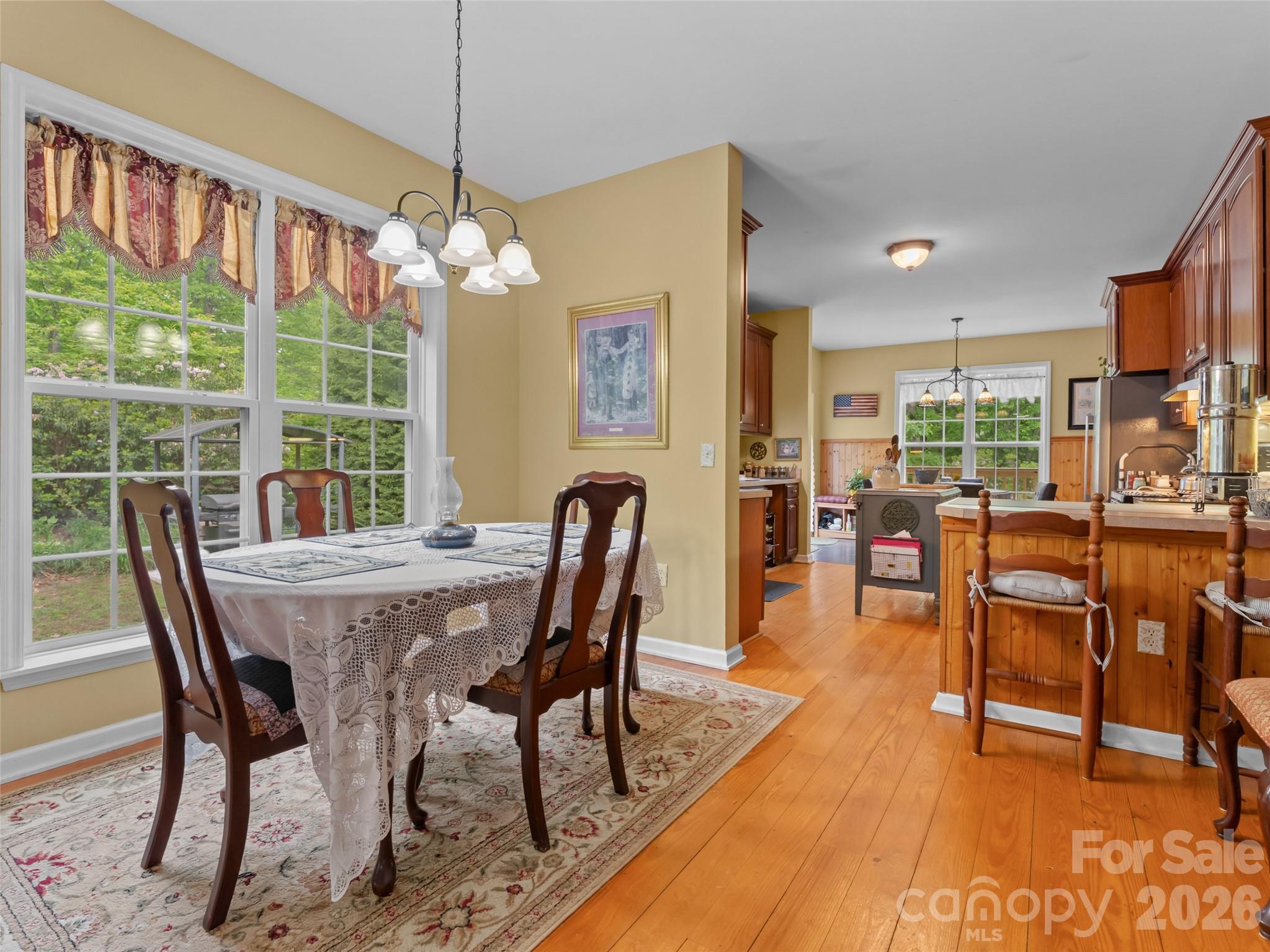 103 Old Southside Road Saluda, NC 28773 - Photo 15 of 48 a view of a dining room with furniture window and outside view