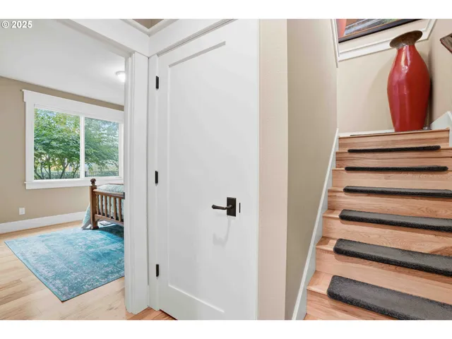 a view of entryway with wooden floor