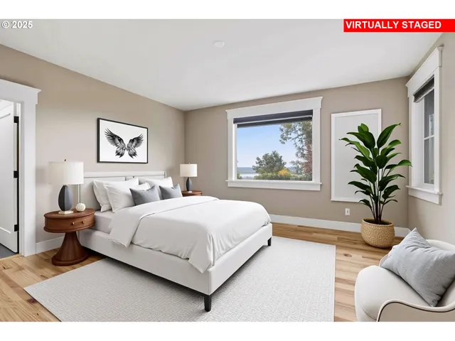 a spacious bedroom with a large bed and a couch