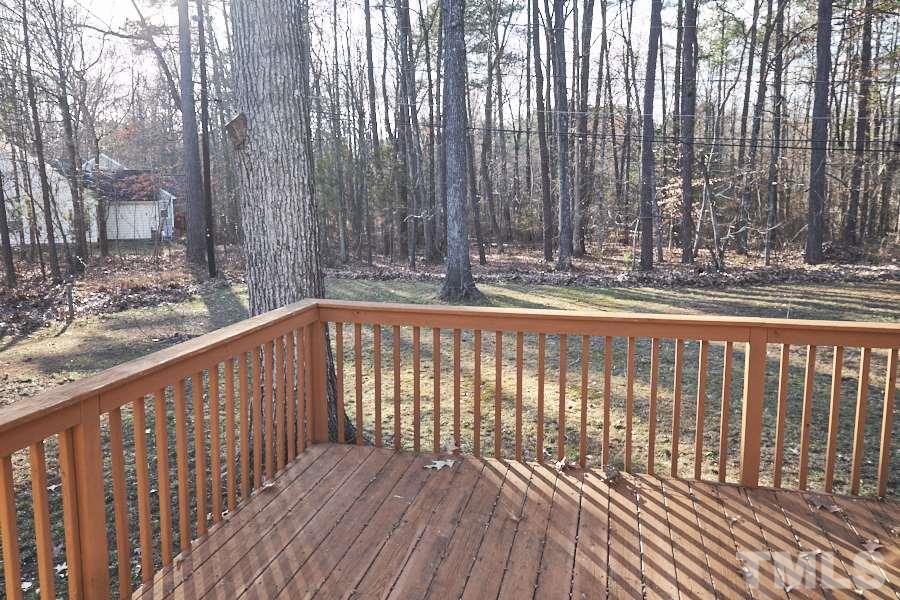 5908 Newhall Road Durham, NC 27713 - Photo 22 of 23 a view of a wooden fence