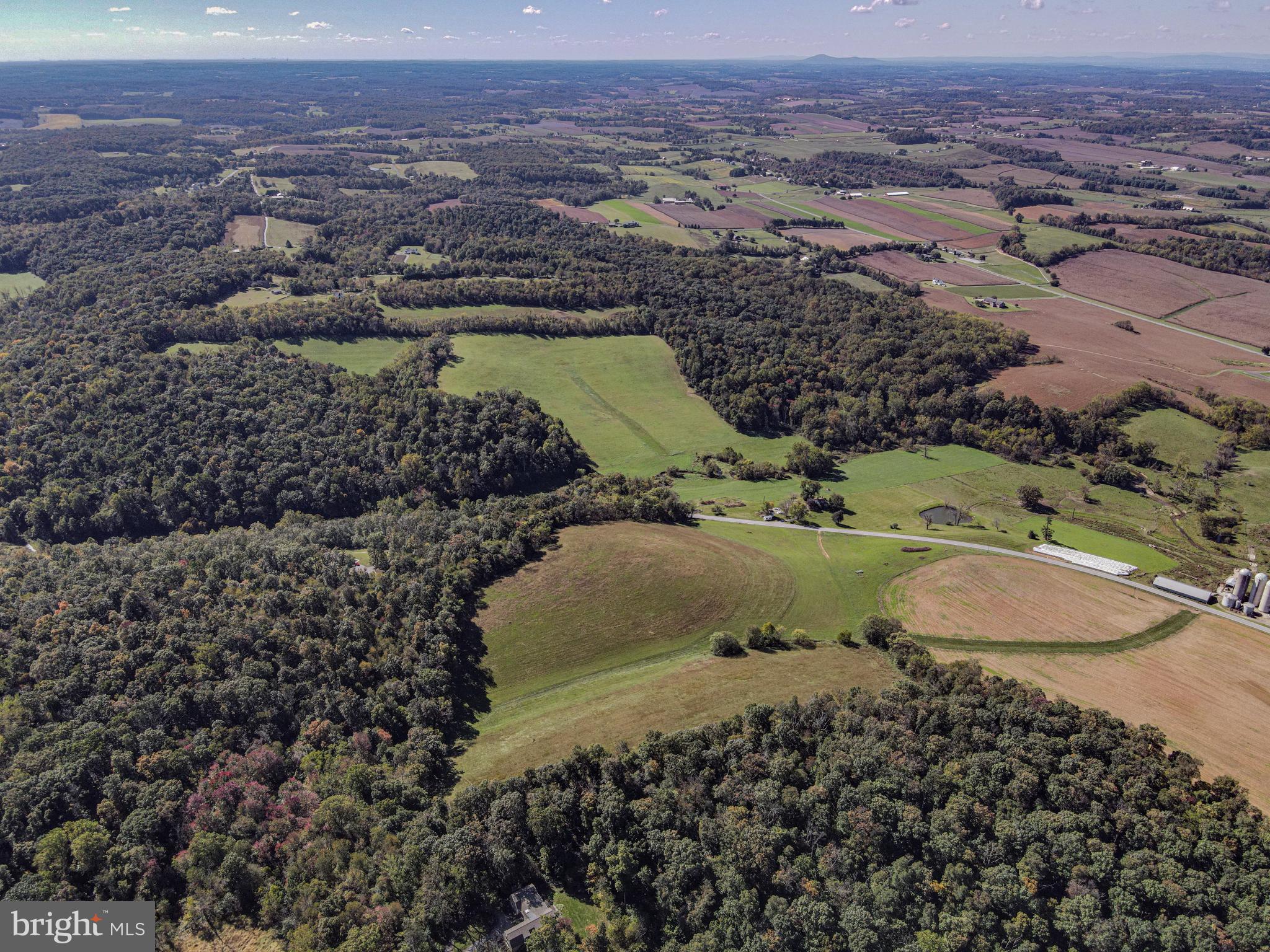 4205 Sams Creek Road New Windsor, MD 21776 - Photo 103 of 103 a view of a houses with a yard