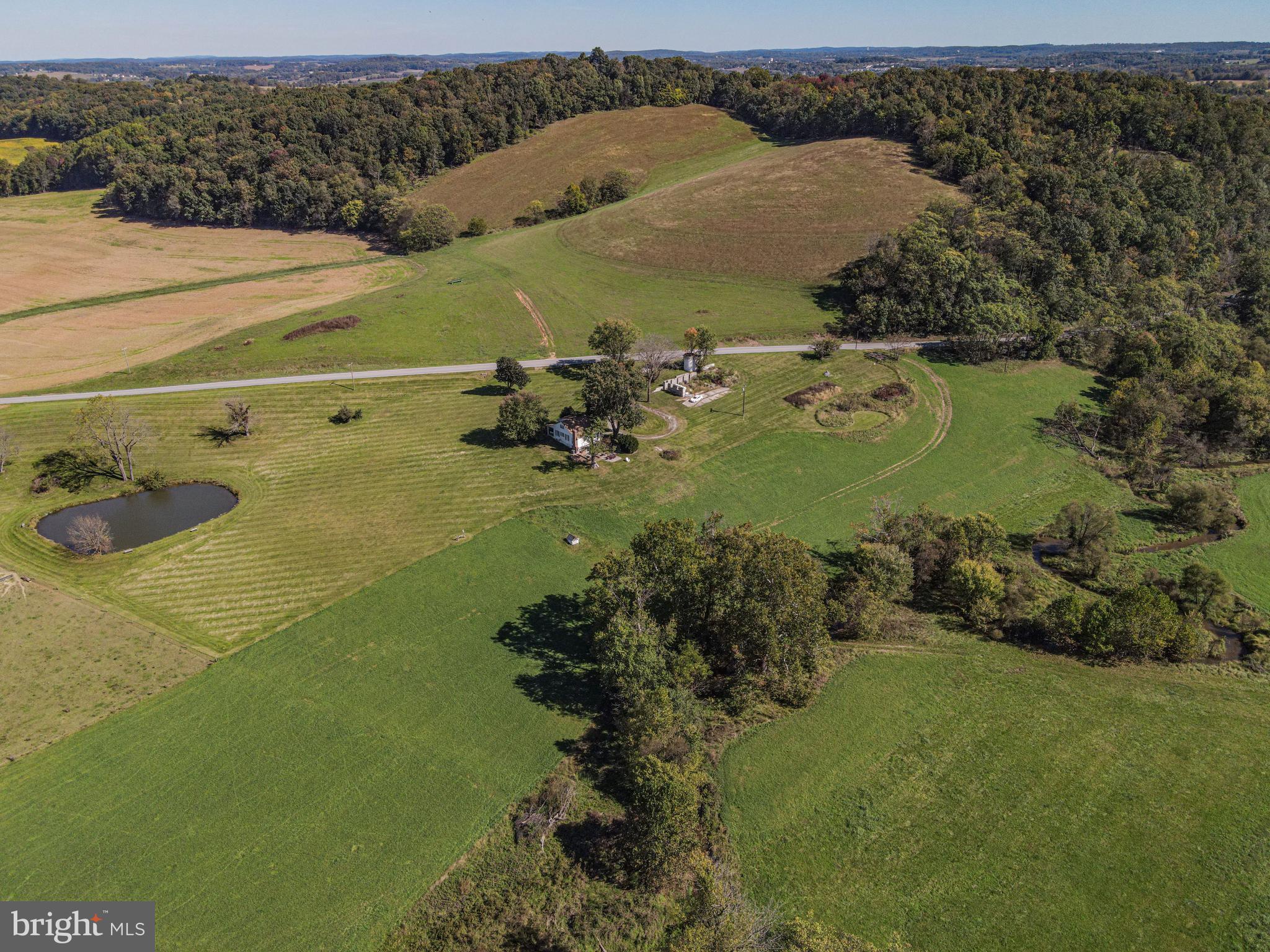 4205 Sams Creek Road New Windsor, MD 21776 - Photo 13 of 103 a view of a lake with a yard