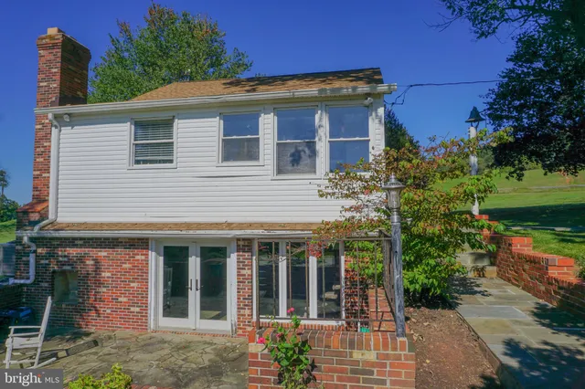 front view of a house with a big yard