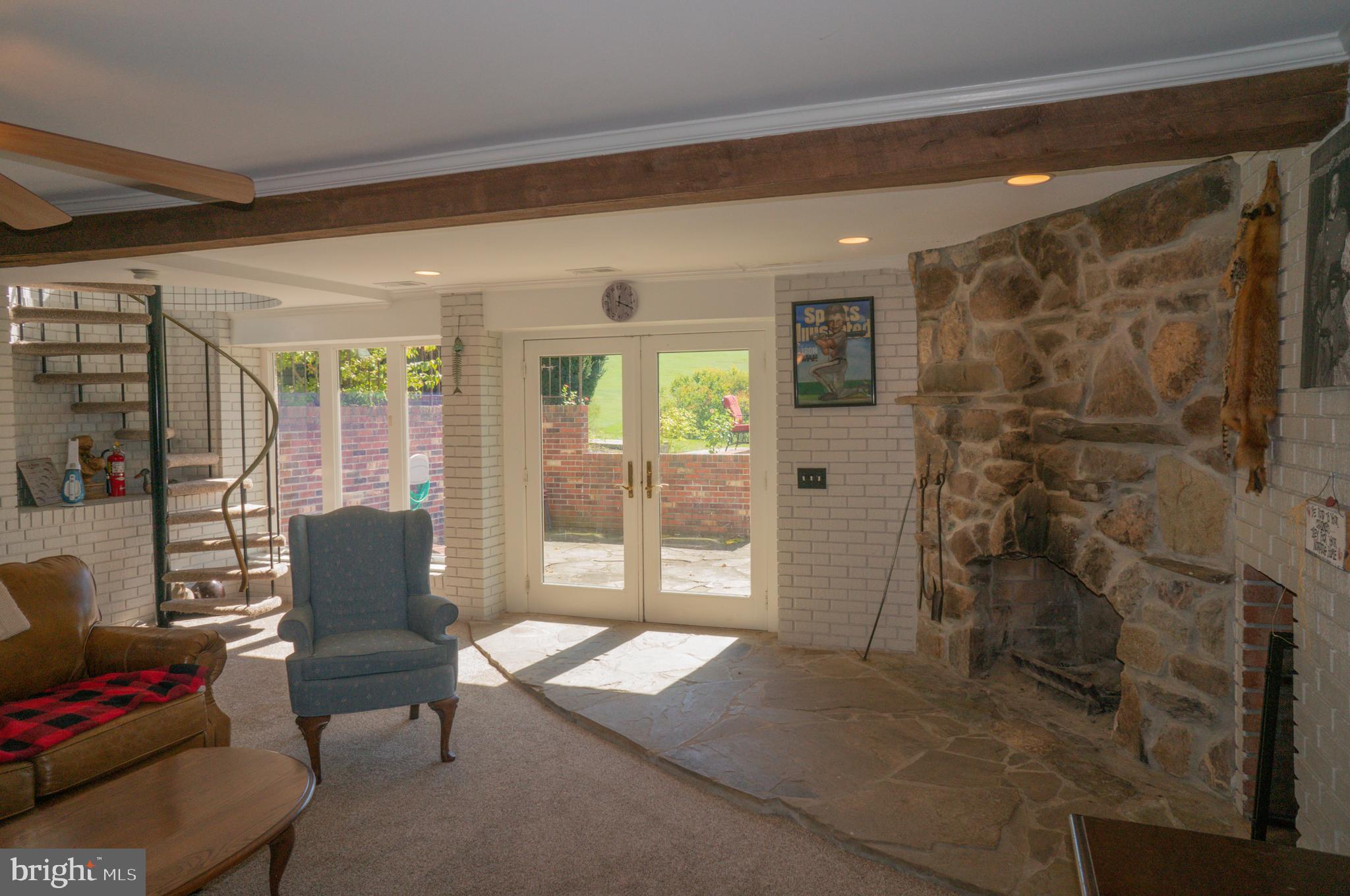 4205 Sams Creek Road New Windsor, MD 21776 - Photo 32 of 103 a living room with furniture and a window